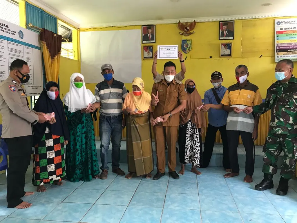 BLT Dana Desa Disalurkan Ke Masyarakat Mekar Laras Batu Bara