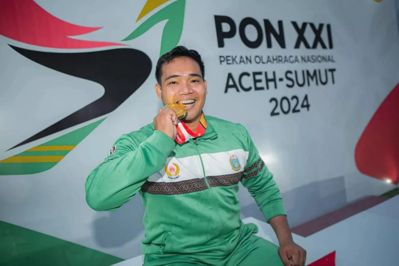 PON XXI, Syahrial Bakti Pecahkan Rekor Tolak Peluru.